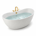 Vasca da bagno ovale in ceramica bianca con finiture in ottone